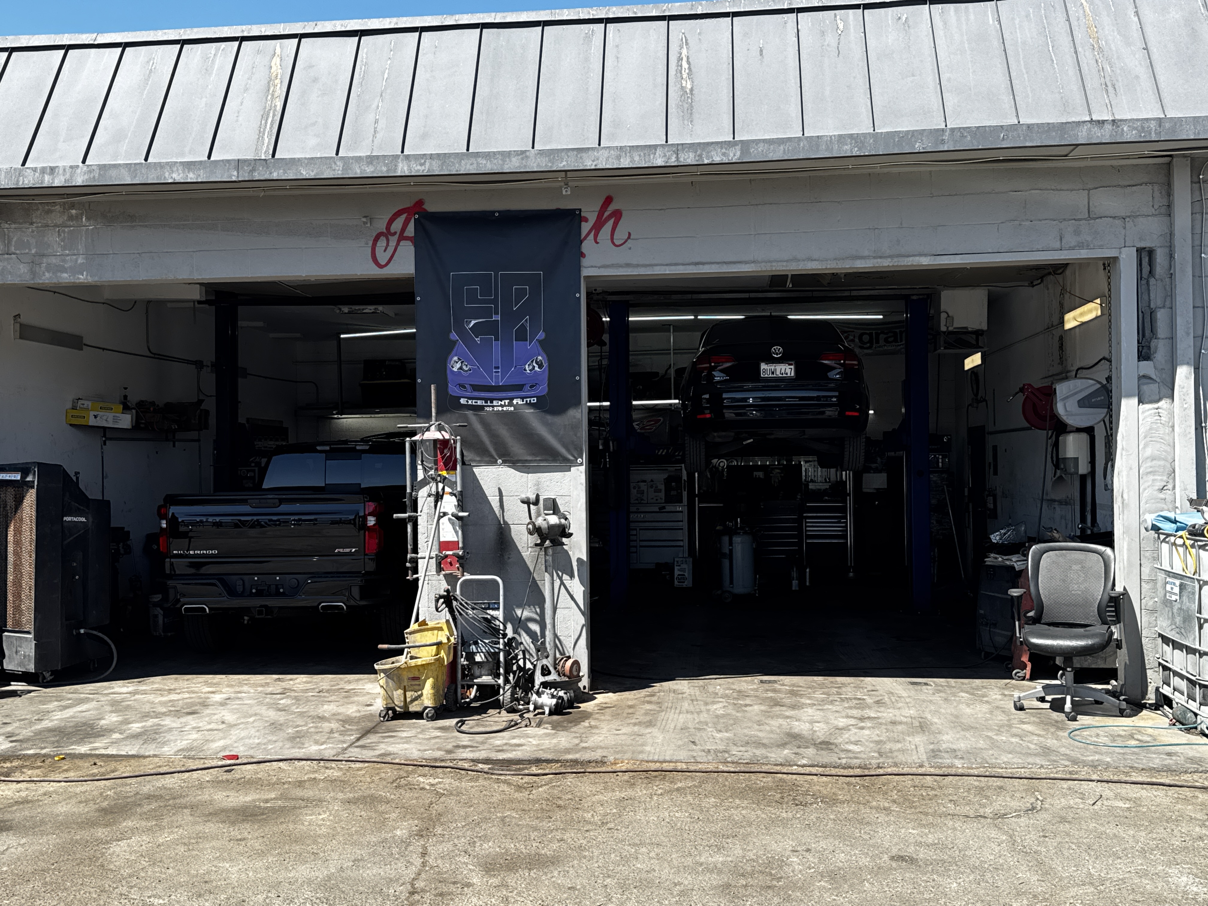 Excellent Auto storefront and open service bay.